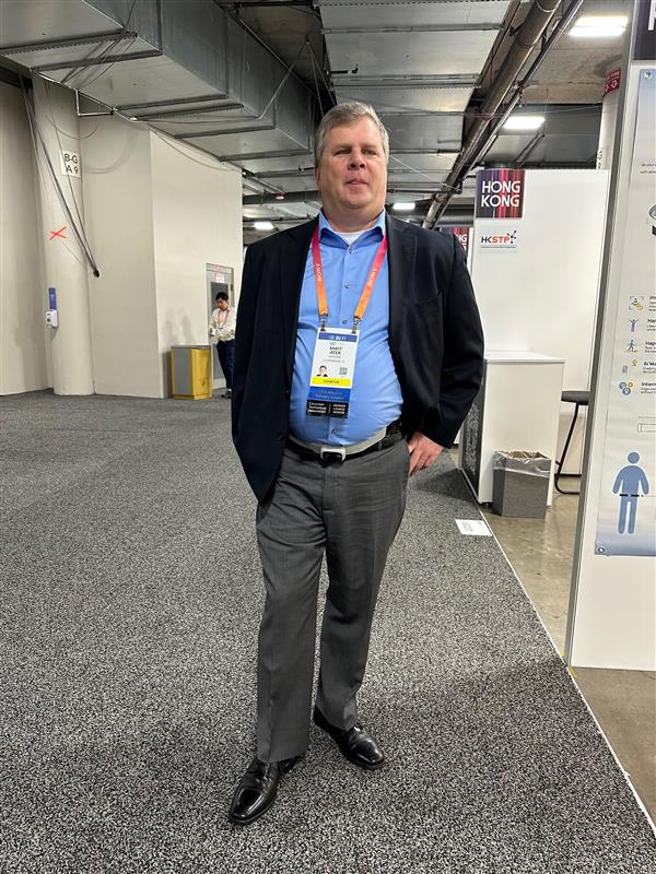 Matt Ater walking through the booth and display areas at CES