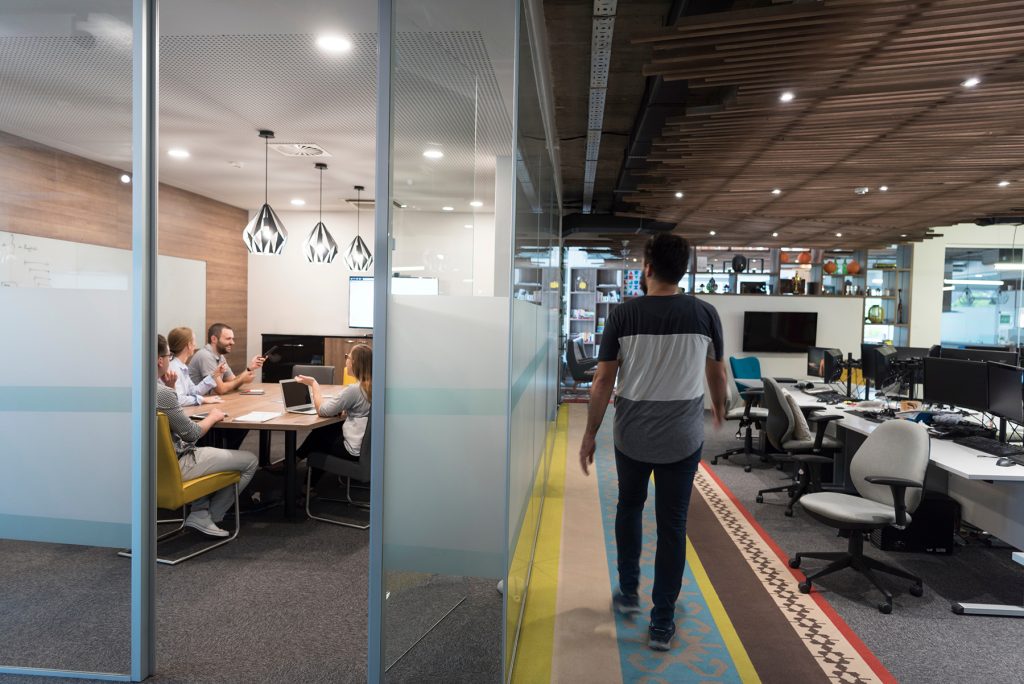 Team members brainstorming during a collaborative startup meeting.